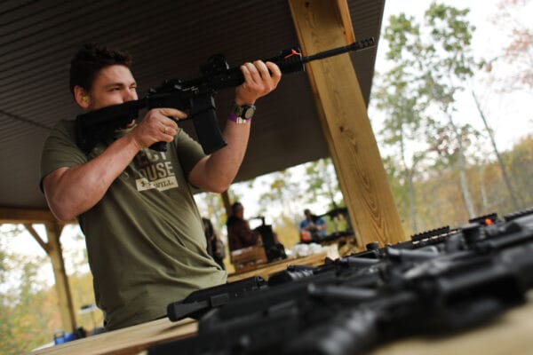 Lifestyle shot of rifle with Alamo-15 installed at the shooting range.